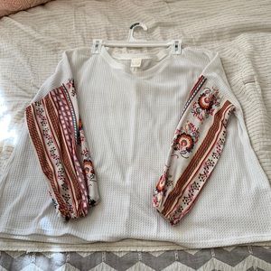 White long sleeve women’s top with floral sleeves